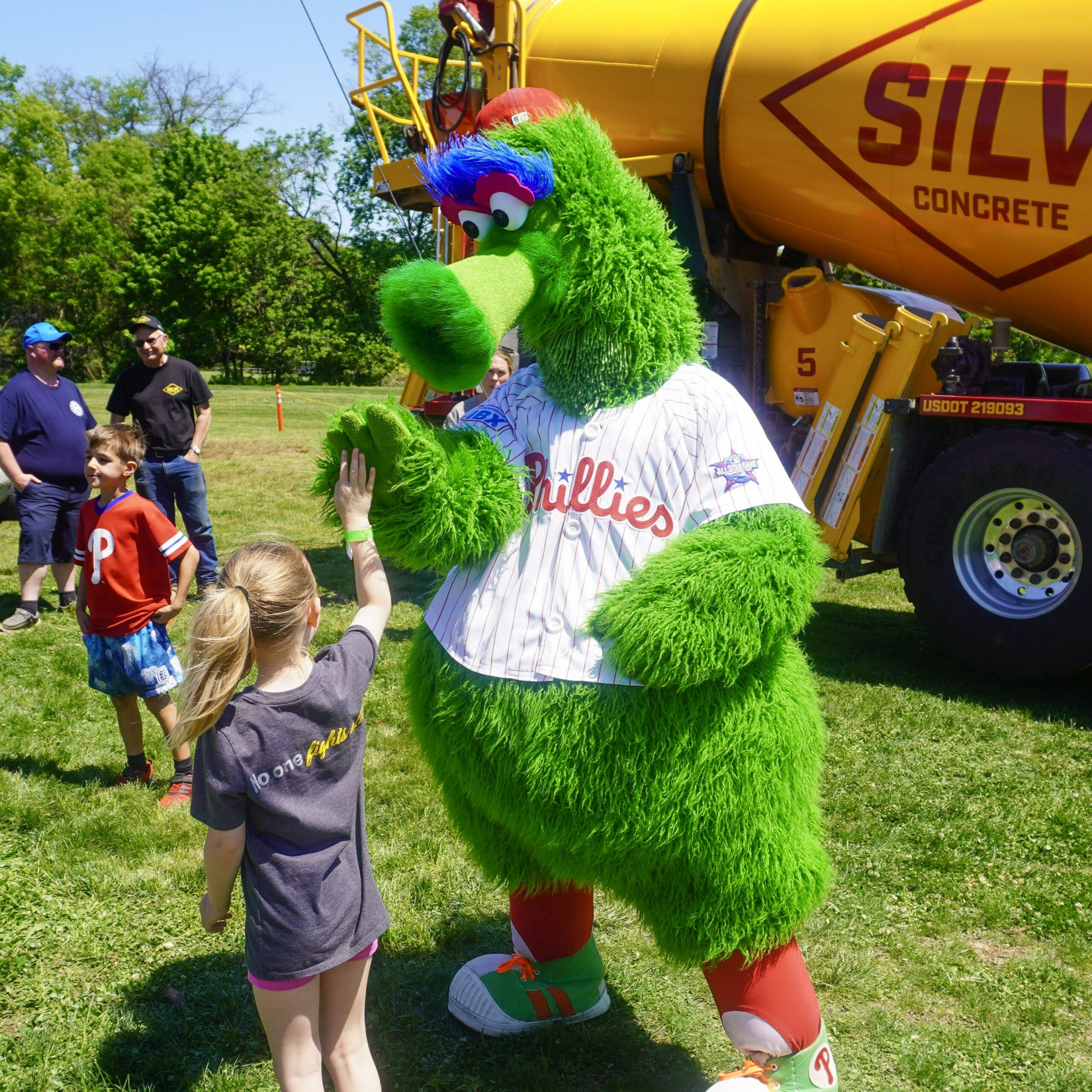 A photo of the Phillie Phanatic interacting with an attendee at the Silvi Foundation Touch-a-Truck.